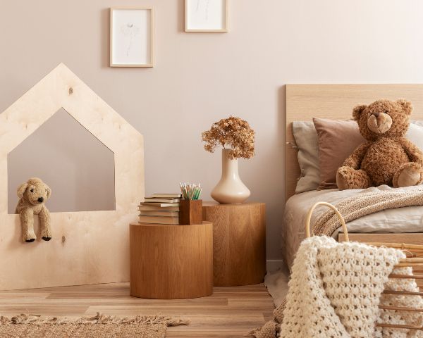 child reading a book on their bed