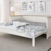 Ideal for a sleepover or great to use as a guest bed when visitors come to stay. When the extending bed is not in use and tucked neatly under the bed, we recommend stacking the 2 single mattresses on the day bed for day to day use. Manufactured from a solid Scandinavian Pine and finished in a fresh white lacquer with gorgeous oak lacquer detailing surrounding the bed.
