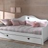 A gorgeous white daybed with an elegant shaped back and pretty cut out heart detailing. This daybed is a great feature in any bedroom or guestroom and with the underbed pull out drawer you can create an additional sleeping space as a trundle for sleepovers or use it as a place for storage, ideal for clothes, games or books.
