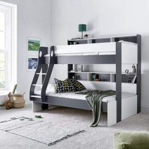 The Lisbon Gray & White Triple Wooden Bunk Bed saves space and has lots of storage. Its white colour looks good in any room. It's a modern and useful bed. The bottom bunk is low to the ground, making it safer and the room feel bigger. Both bunks have shelves for books or toys. The shelves have dividers to help organize things. The top of the shelves have a raised edge to stop things from falling behind. You can put the ladder on either the left or right side.
