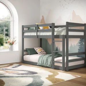Polaris Low Shorty Grey Bunk Bed The Polaris Low Shorty Bunk Bed is a great choice for a child's bedroom. It's a double bunk bed designed for easy self-assembly, made from durable pine wood. The shorty-sized mattress and slatted base provide comfort and support. With its low height and classic design, this bunk bed is both practical and attractive for children.