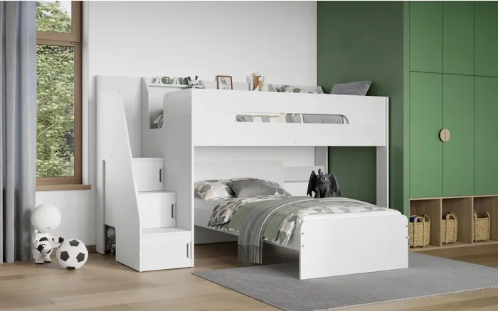 Stepaside L Shaped Triple Sleeper White This high bed is great for kids who need a comfy and safe place to sleep. It also has a single bed for siblings or friends. It has stairs that are also storage cabinets, so you get more space and the stairs are easy to climb. The raised sides make it feel cozy and safe. The stairs are safer than a ladder on a regular bunk bed.