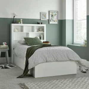The Oscar White Wooden Ottoman Storage Bed integrates aesthetic design with practical storage capabilities, rendering it suitable for adolescent bedrooms or areas where space is limited. Constructed with a refined white finish and a modern aesthetic, this single ottoman bed incorporates a functional bookcase headboard, advantageous for storing books, decorative items, or necessities. The Oscar bed provides a generous ottoman storage compartment beneath the mattress, readily accessible via a gas-piston mechanism, and configurable to open from either lateral side to accommodate diverse room configurations. Fabricated from premium materials, this bed offers both durability and utility, positioning it as a favorable option for developing adolescents requiring supplementary space and style.