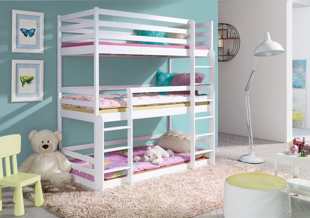 The Bergamo bunk bed is a triple-occupancy sleeping unit, equipped with two universal ladders and three levels, each featuring safety guardrails. The unit is finished in a sophisticated matte white colour, which allows for seamless integration into any interior design, irrespective of wall coloration. The ladders are universally designed and can be assembled on either the left or right side. Furthermore, these beds possess the capability to be disassembled into three individual sleeping units. The construction is of solid pine wood. A slatted bed base, also crafted from pinewood, is included. The colour finish is white.