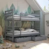 The Nico Grey bunk bed offers a practical, high-quality, and safe sleeping solution. The integrated ladder and guard system are designed to enhance the safety of the sleep area. Furthermore, discreetly integrated storage drawers provide ample space for clothing and toys. The ladder is universally designed and can be affixed to either side during assembly. These bunk beds possess the capability to be disassembled and utilized as two individual beds. The construction material is solid pine wood. A slatted bed base, also crafted from pinewood, is included. Two under-bed storage drawers are supplied with the unit.