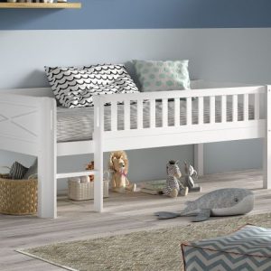 Introducing the Nyla Cabin Bed, a new addition to our Vipack collection. This bed features a distinctive headboard with a cross pattern and a slatted side, setting it apart from other cabin beds. Constructed from robust Scandinavian pine wood, it offers durability and longevity, providing peace of mind for parents. The Nyla Cabin Bed includes a straight ladder with handles to ensure safe and easy access for children. This bed is suitable for children aged 4 and above. The ample space beneath the bed can be used for storage, or children can transform it into a creative play area for themselves and their friends or siblings.
