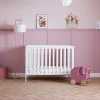 The Pensham Mini cot bed is designed to accommodate your child's growth. Suitable from birth to approximately three years of age, its three-position mattress height provides an appropriate setting for each developmental milestone. Transitioning to a toddler bed is facilitated by the simple removal of the sides, creating a comfortable sleeping space. An optional under-drawer is also available, offering convenient additional storage for your child's belongings.