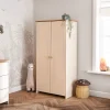 The Pensham double wardrobe offers good storage with two hanging rails. Its classic look, beautiful natural wood, and elegant brass handles are stylish. Inside, there's plenty of room with two hanging rails and one wide shelf to hold all your baby's cute clothes.