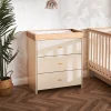 The three big drawers with nice brass handles offer lots of storage. The beautiful natural wood changing top can be removed. So, when your child is older, you'll have a lovely dresser that will look good in any room for a long time.