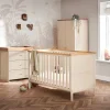 It has a modern shape with pretty wood and special brass parts.  The Obaby Pensham collection is great for parents who want modern looks and useful features.