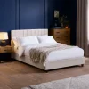 Create a comfortable and stylish sanctuary with this small double bed. The headboard has vertical panel detailing and soft cushioning for added comfort. The Oatmeal Linen upholstery is neutral and will fit with any bedroom décor. It has a low-profile base and black legs, making it ideal for smaller rooms or minimalist styles.