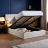 Make your bedroom a fancy and useful space with this bed that has a storage ottoman. The headboard has simple panel designs and soft padding for a nice, comfy look. It's covered in soft Oatmeal Linen, so it goes well with anything. The mattress lifts up to show a lot of hidden storage, perfect for keeping your room neat. It has cool black legs, so it looks good and is practical too. 