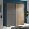 Make your bedroom look better with this stylish wardrobe that saves space. It has sliding doors, so it's easy to use and doesn't take up much room. Each side has a bar for hanging clothes and a shelf on top for other things. The doors slide smoothly, making it easy to get to your stuff.